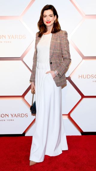 Anne Hathaway's best looks - The jumpsuit/blazer combo