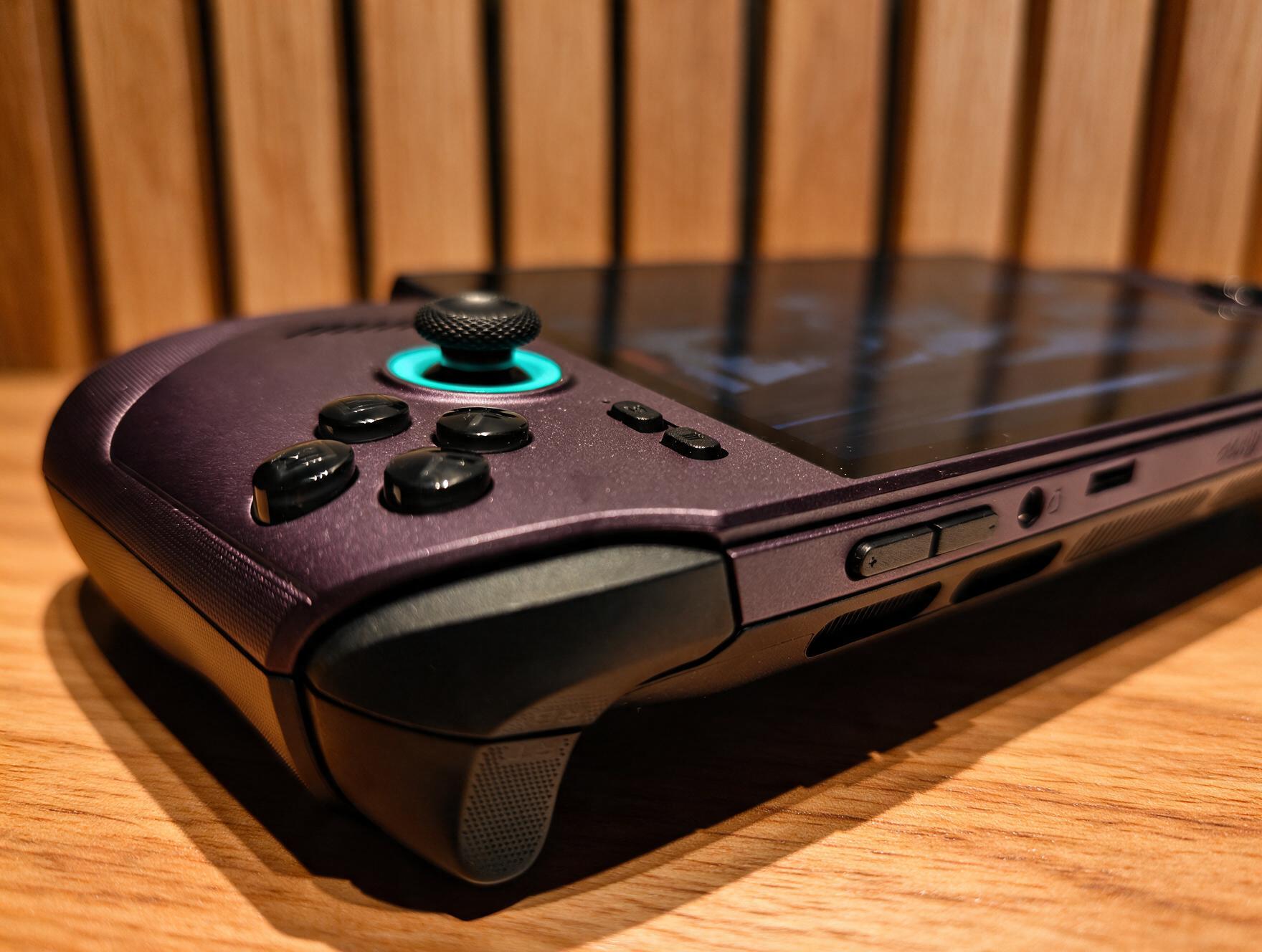 MSI Claw 8 EX AI+ &amp;ndash; a purple gaming handheld with a large screen shows a handheld console displaying a red racing car
