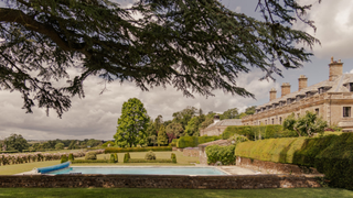 View of a swimming pool in the grounds of Redlynch House