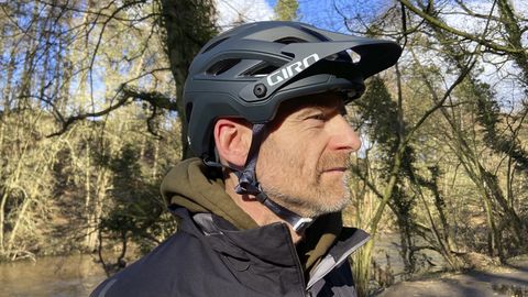 Giro Merit helmet worn by a middle aged man amongst the trees