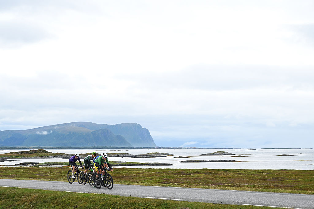 The breakaway riding along the coast