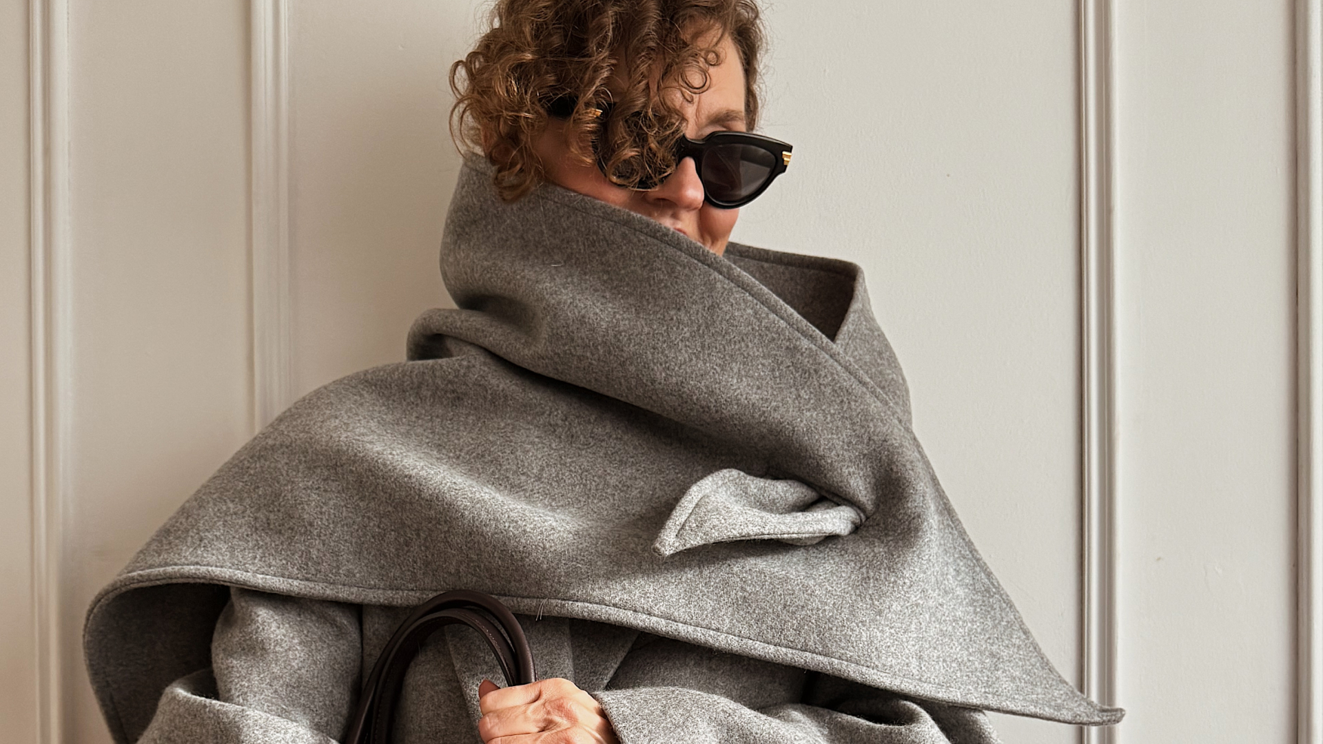 Renia Jazdzyk wearing a scarf coat