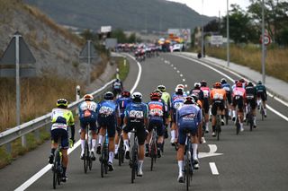 The peloton split early during stage 18