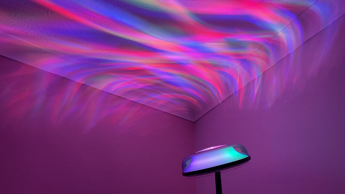 The Govee Uplighter is projecting multicolored ripples of light onto the ceiling.