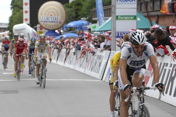 Fabian Cancellara (Saxo Bank) comes through the line with overall leader Tadej Valjavec on his wheel.