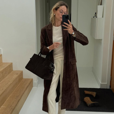 woman wearing brown suede jacket trend