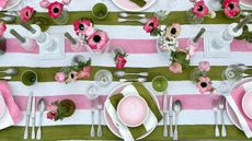 Pink green and white striped table setting 