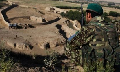 An Afghan soldier surveys a valley in Northwest Afghanistan.