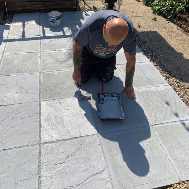 Homeowner uses stencil to paint the patio – and it looks amazing ...