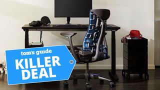 Herman Miller gaming chair in front of a desk and monitor