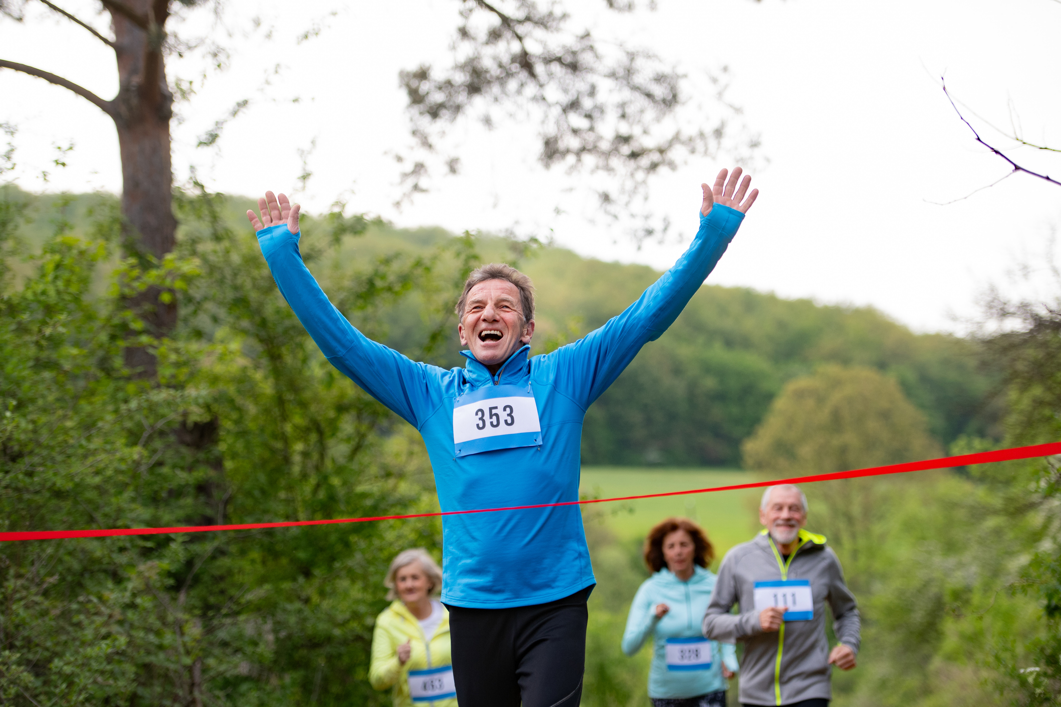 Older man winning a race