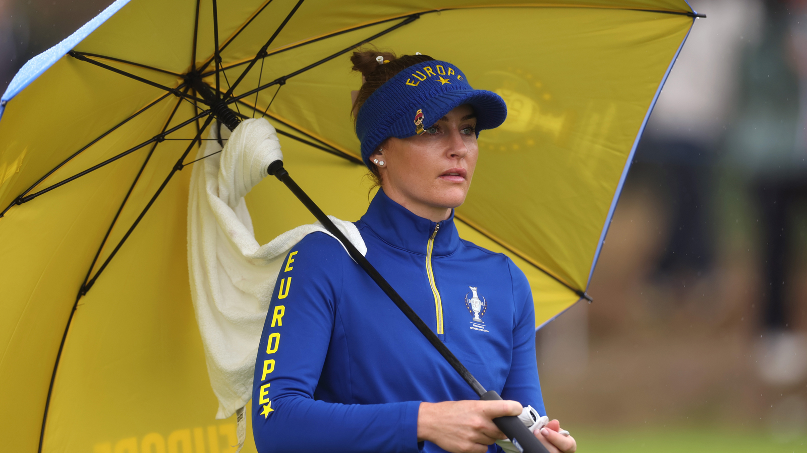 Charley Hull looks on