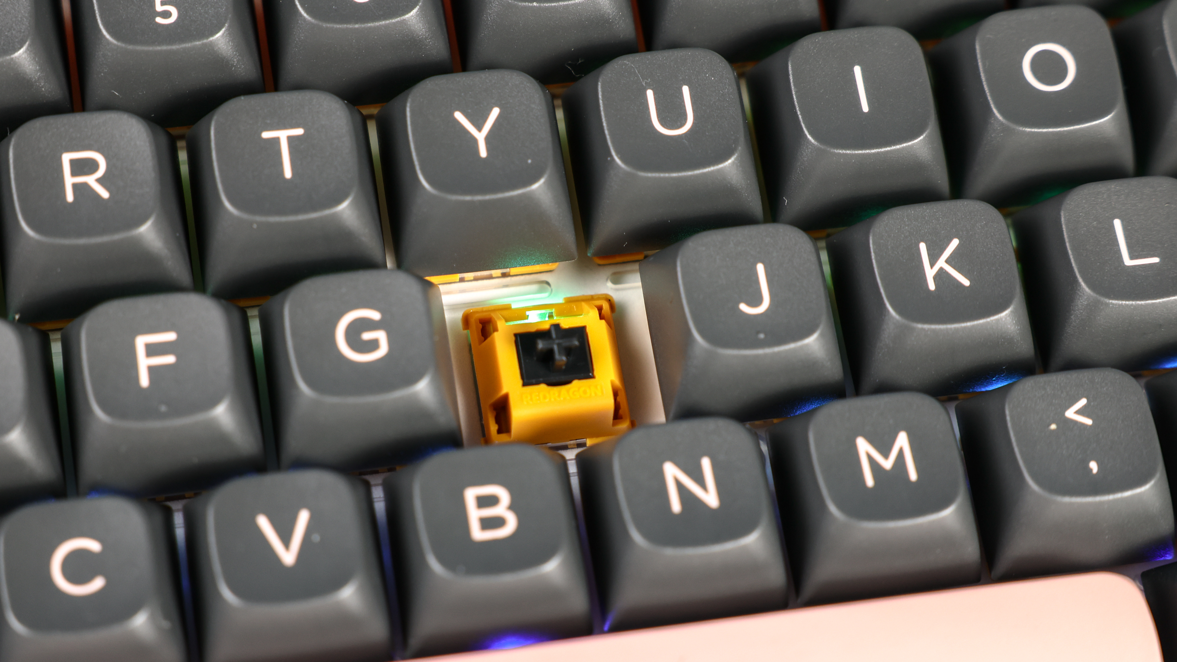 Redragon Eclipse K720 Pro photographed in front of a blue background.