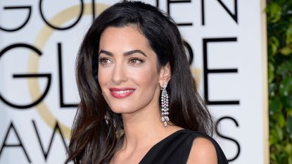 Amal Clooney's Charlotte Tilbury lip products are on sale. Seen here she attends the 72nd Annual Golden Globe Awards held at the Beverly Hilton Hotel on January 11, 2015