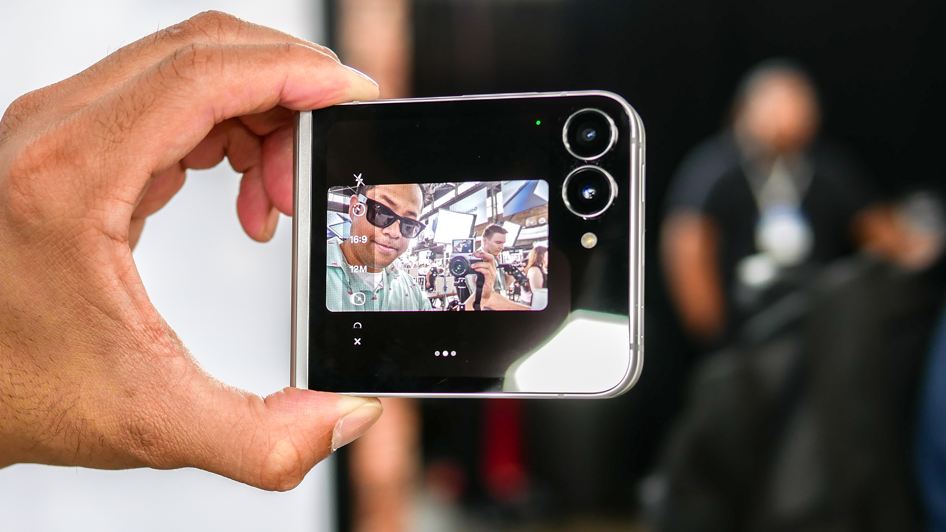 Samsung Galaxy Z Flip 7 FE held in the hand.