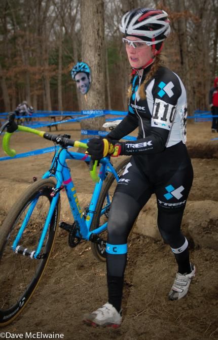 Ellen Noble (Trek Cyclocross Collective) running the log barriers