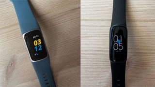 Photograph of the Fitbit Luxe vs Fitbit Charge 5 side by side on a table