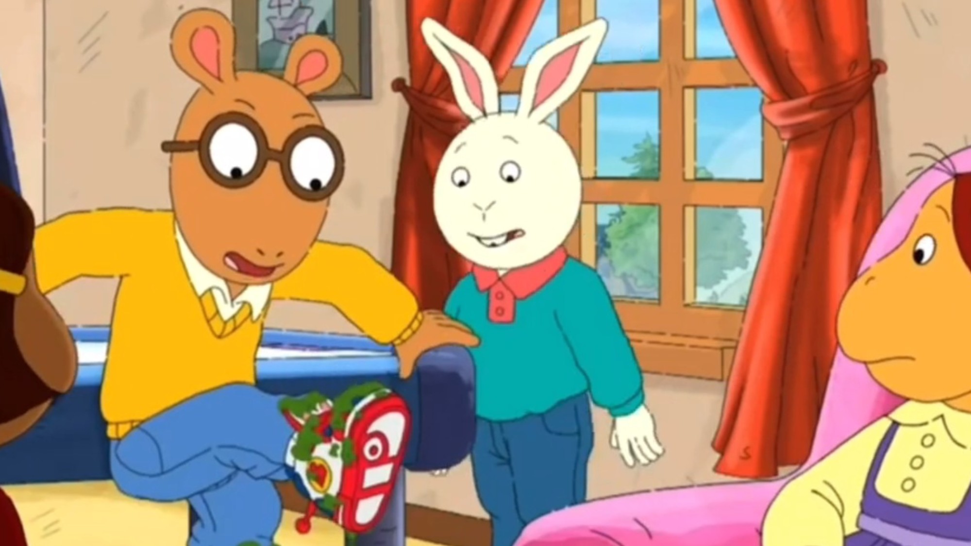 A none too pleased Arthur with green gunk on his shoes in Arthur