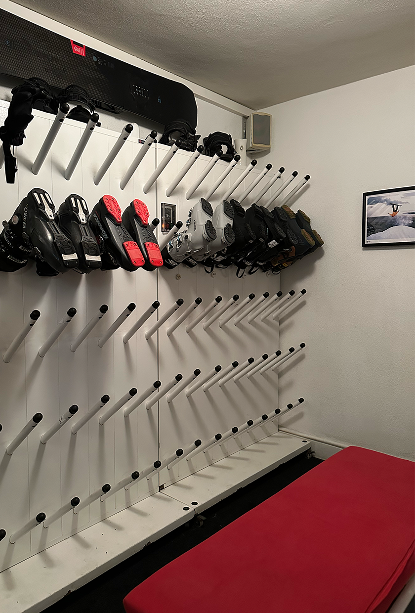 Ski gear at the Experimental Chalet Verbier in the Swiss Alps.