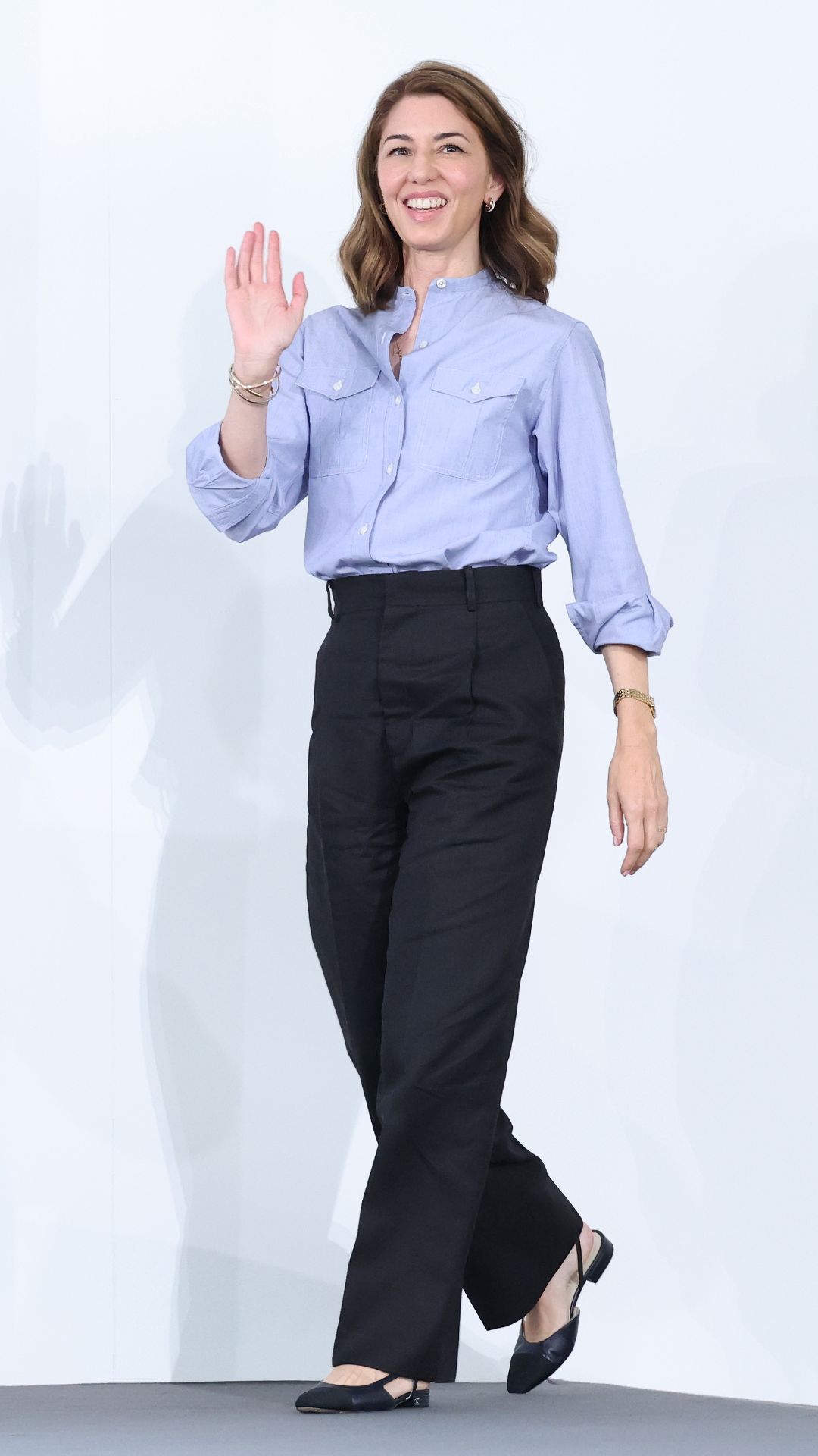 SOFIA COPPOLA WEARING A SHIRT AND PANTS OUTFIT