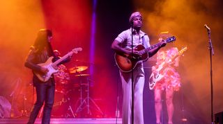 (from left) Mark Speer, Leon Bridges and Laura Lee perform onstage at the Hinterland Music Festival on August 08, 2021 in St. Charles, Iowa