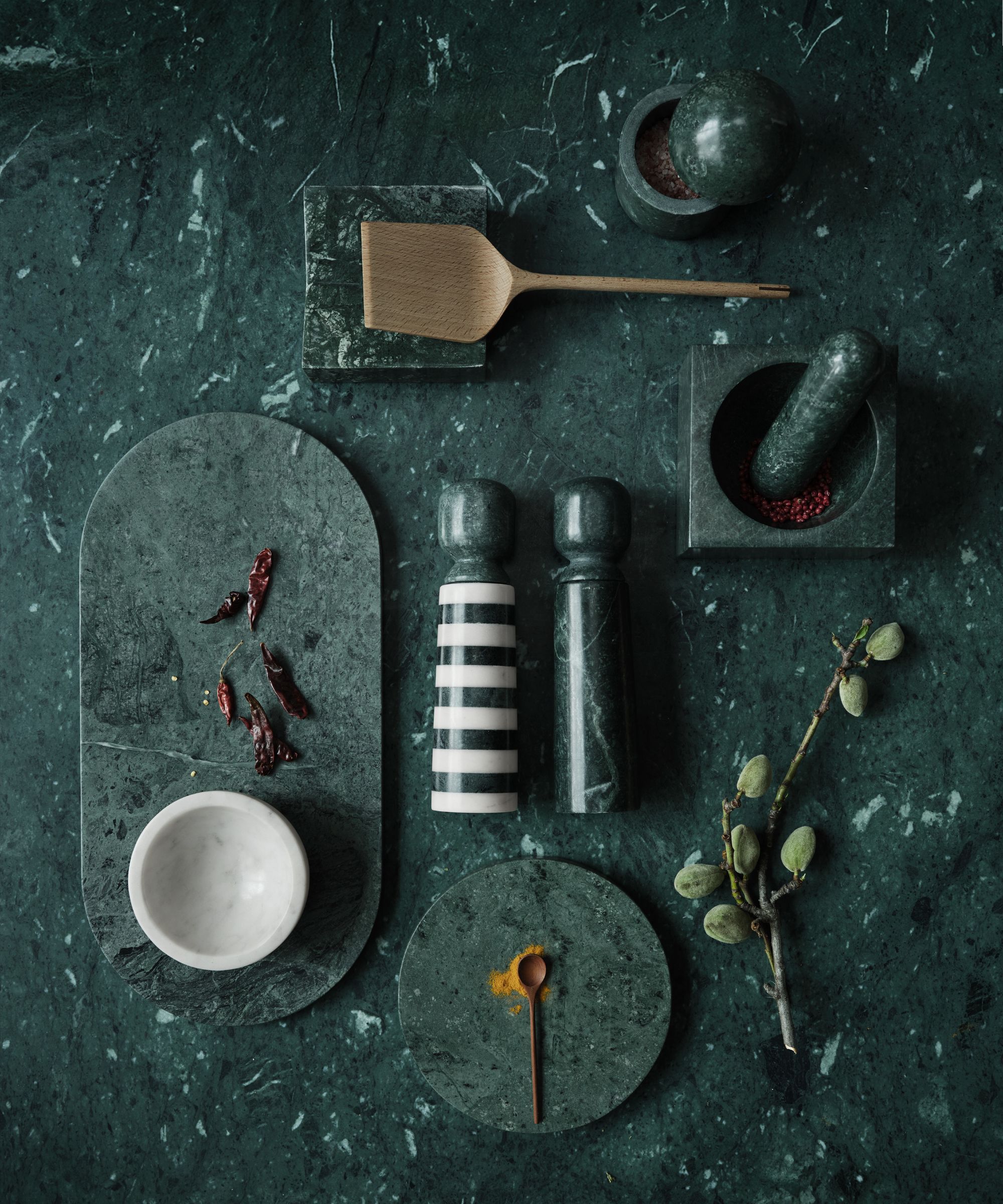Daniel Humm x Crate & Barrel pieces in green marble on a green marble surface