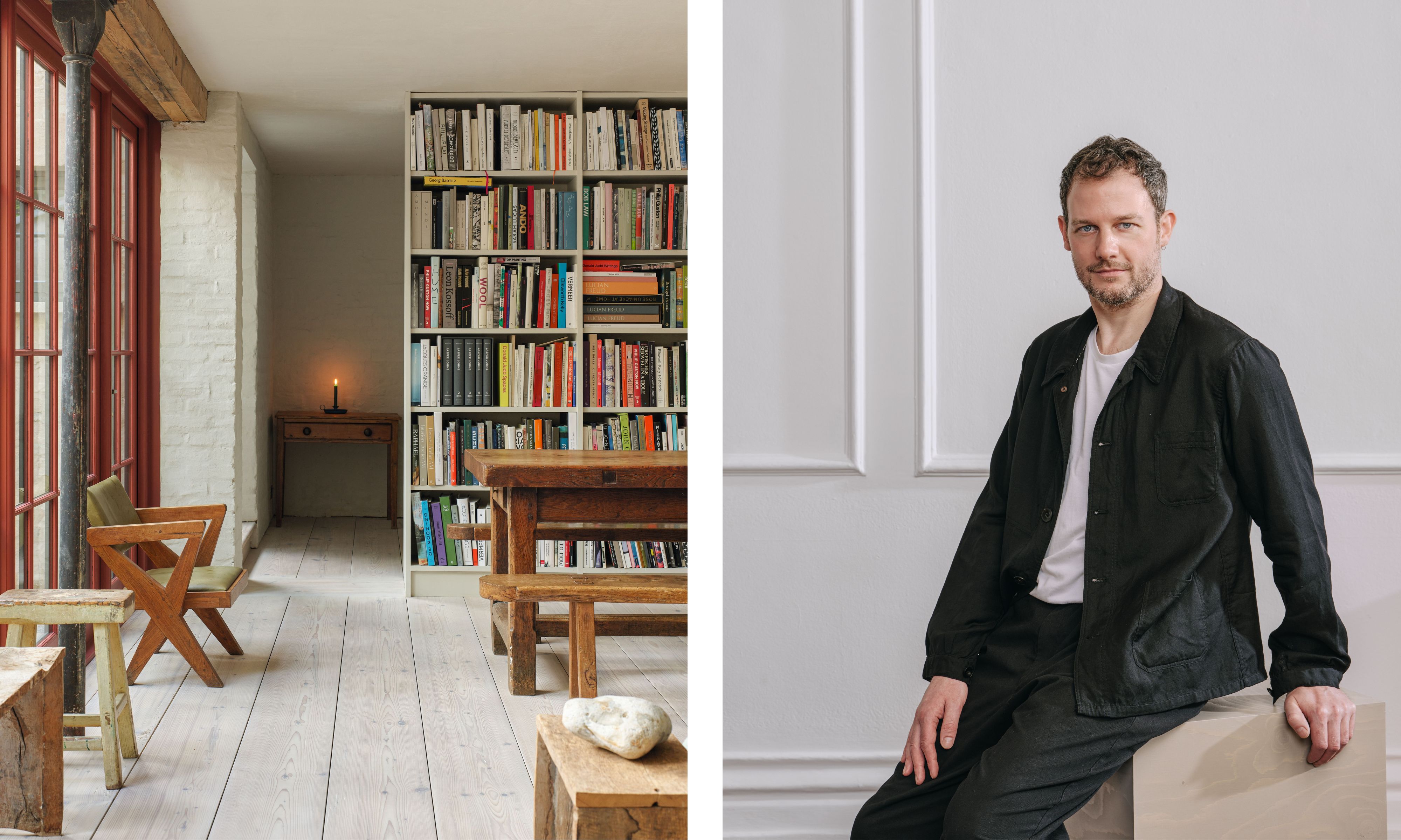 rustic room with white wood floors, a large bookshelf, and a chunky wooden table. Right: Designer Matthew Taylor in a black work shirt sits on a grey plinth against a white paneled wall