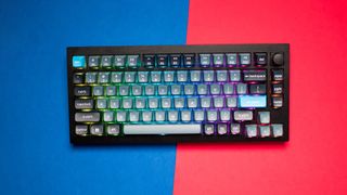 Keychron Q1 Pro hero shot with RGB lighting against red and blue background