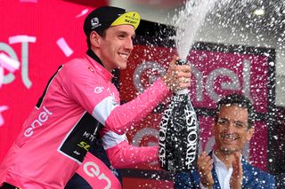 Simon Yates celebrates another day in pink