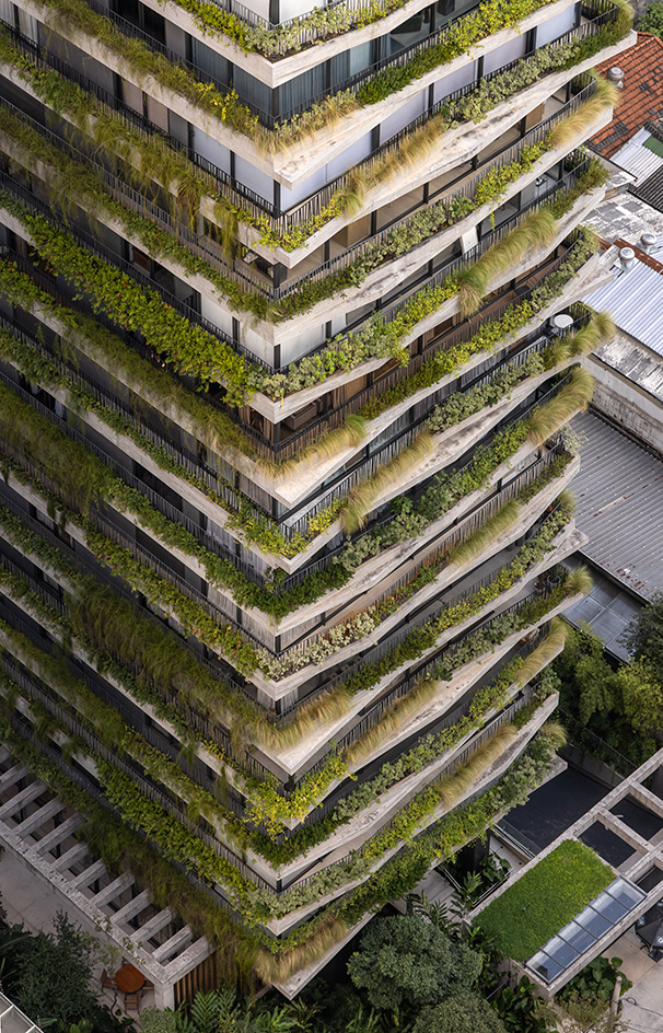 green work by work by Rodrigo Oliviera landscape architect against modern buildings