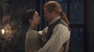 claire and jamie hug in outlander season 7 part 2