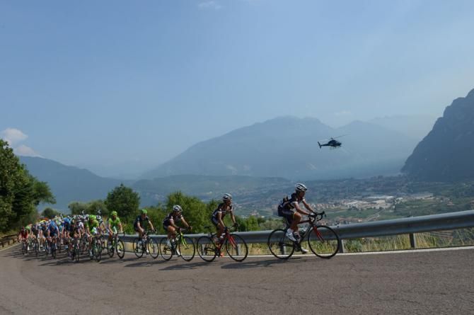 Team Colombia sets the pace on the front of the peloton