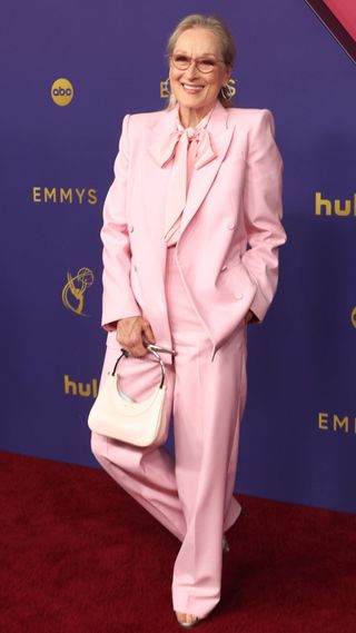 Meryl Streep at the 2024 Emmy Awards in a powder pink power suit