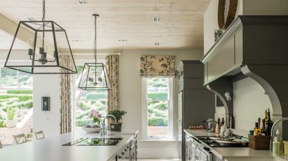 kitchen with island and statement lighting