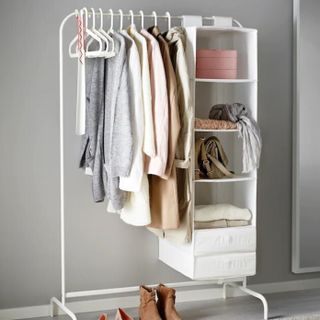 White clothing rack with clothes and accessories from IKEA