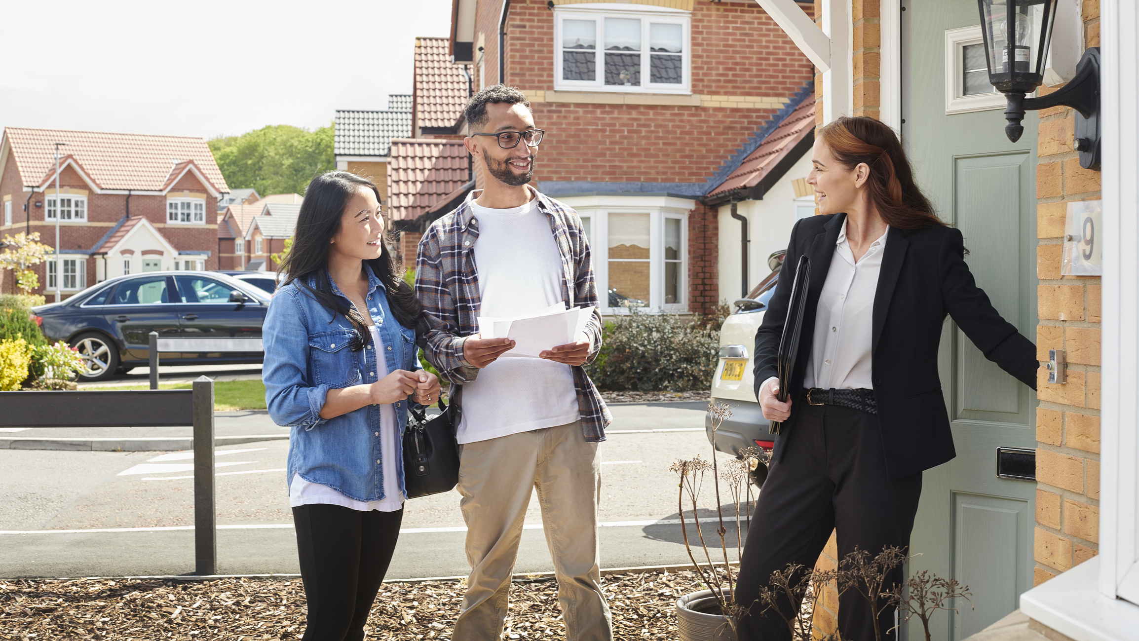 Young couple viewing a house to buy with Lifetime ISA