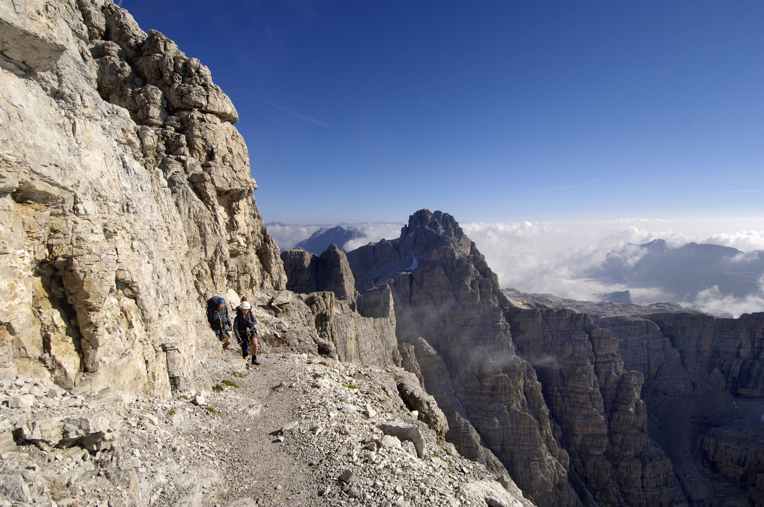 Excursionists on Cengia Garbari near Cima Falkner (2988m). Via delle Bocchette Alte. Dolomiti di Brenta. Trentino Alto Adige. Italy. (Photo by: Stefano Beccio/REDA/Universal Images Group via Getty Images)
