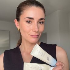 beauty editor Eleanor Vousden holding the Beauty of Joseon SPFs