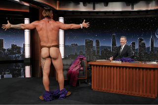 Jason Momoa showing his butt cheeks as he reveals he's wearing a Hawaiian mola on Jimmy Kimmel