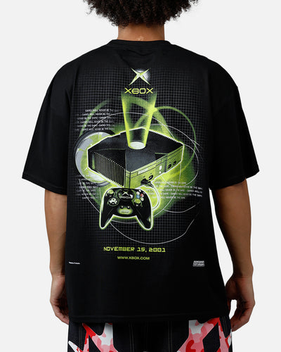 Black tshirt with green graphic design depicting Xbox console