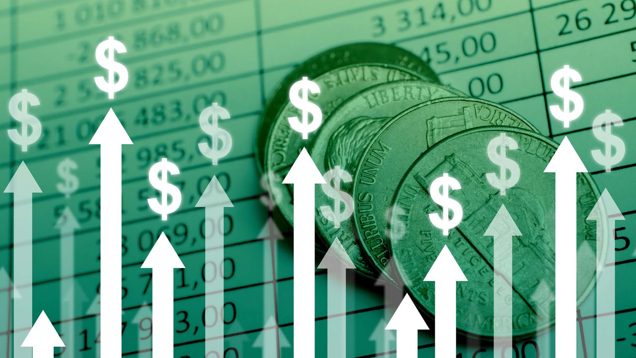 Dollar signs float above arrows pointing up, on a background of a spreadsheet and coins.