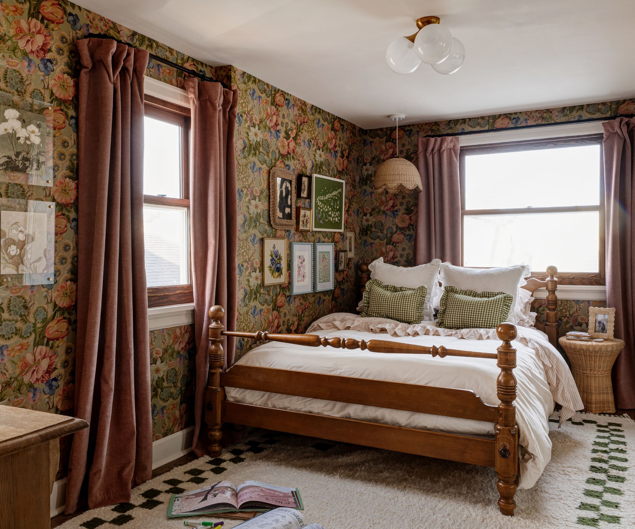 Bedroom with floral traditional wallpaper, vintage wooden bedroom and pink velvet drapes