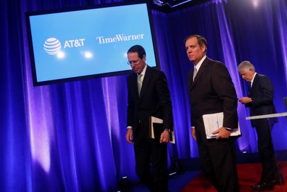 AT&T CEO at a press conference in NYC