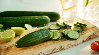 Cucumbers on chopping board