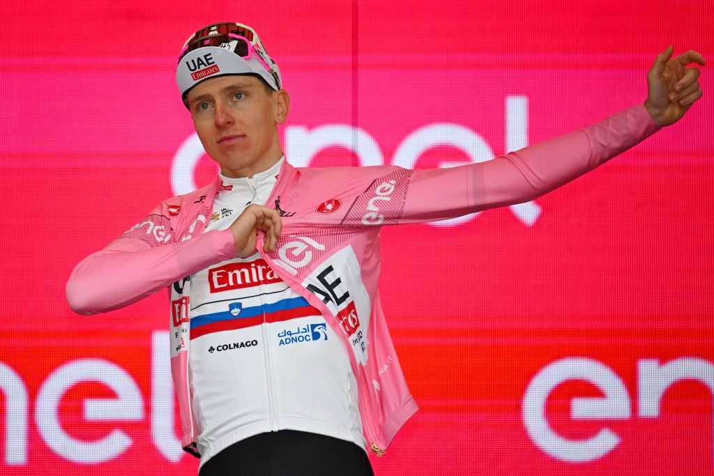 FOSSANO ITALY MAY 06 Tadej Pogacar of Slovenia and UAE Team Emirates celebrates at podium as Pink Leader Jersey winner during the 107th Giro dItalia 2024 Stage 3 a 166km stage from Novara to Fossano 374m UCIWT on May 06 2024 in Fossano Italy Photo by Tim de WaeleGetty Images