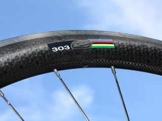 Zipp claims the dimpled surface reduces aerodynamic drag relative to a smooth one