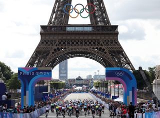 The riders set off in the men's Olympic road race in Paris infront of the Eifel Tower.