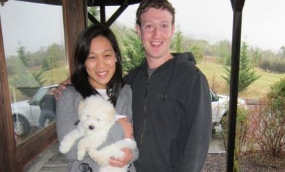 Facebook founder Mark Zuckerberg, with longtime girlfriend Priscilla Chan and their new puppy Beast, finally announced on Facebook that he is "in a relationship." 