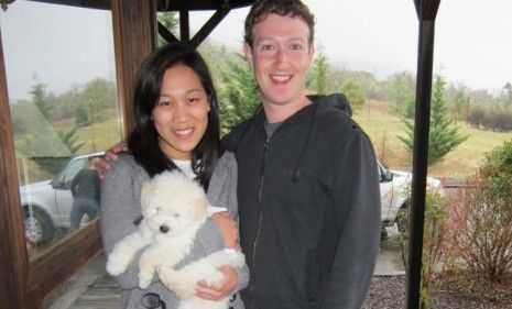 Facebook founder Mark Zuckerberg, with longtime girlfriend Priscilla Chan and their new puppy Beast, finally announced on Facebook that he is &amp;quot;in a relationship.&amp;quot; 