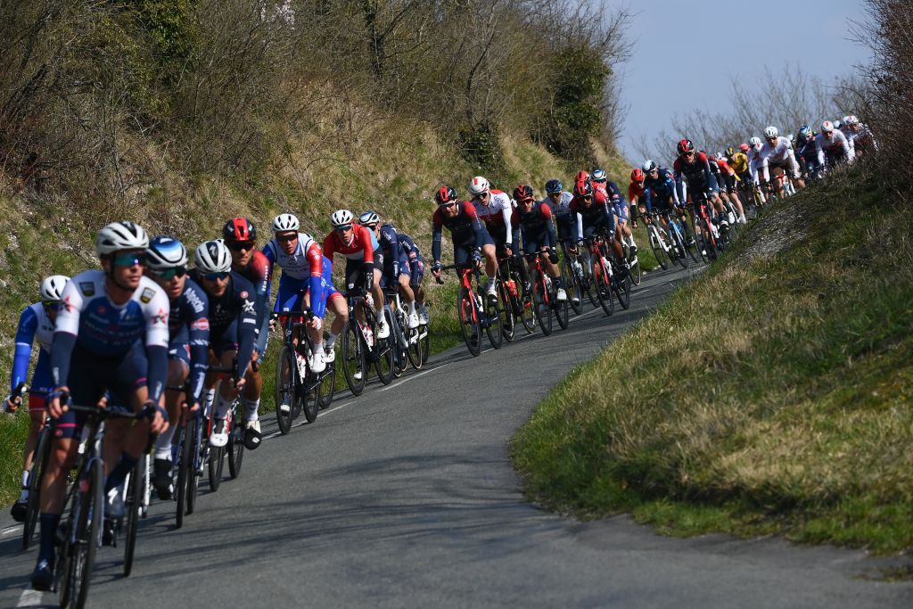 The pack rides during the 1st stage of the 80th edition of the Paris Nice cycling race 160 km between ManteslaVille and ManteslaVille on March 6 2022 Photo by FRANCK FIFE AFP Photo by FRANCK FIFEAFP via Getty Images